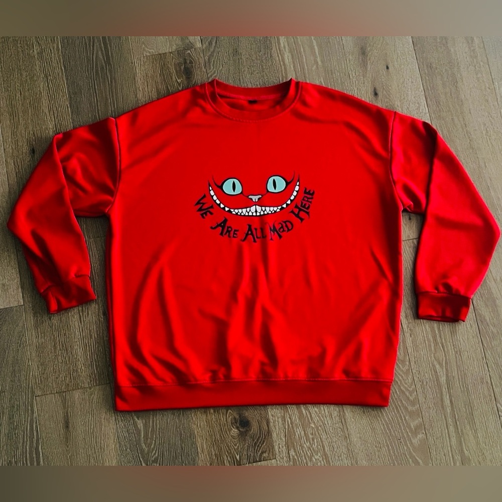 Disney Alice in Wonderland, “We’re All Mad here” sweater. Size:2XL. Gently Used.
